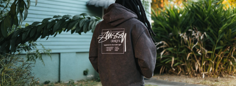 Urban Inked: Exploring Tattoo-Inspired Fashion with Stussy and Essentials Hoodies