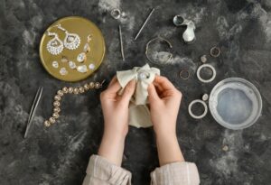 a women clean the jewelry at home