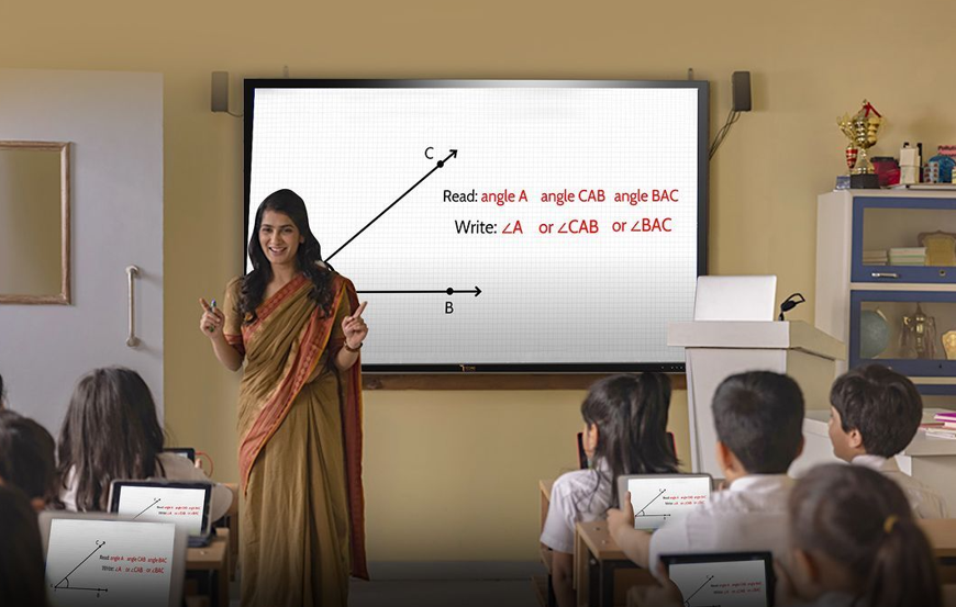 Techser teach a students on interactive flat panel display